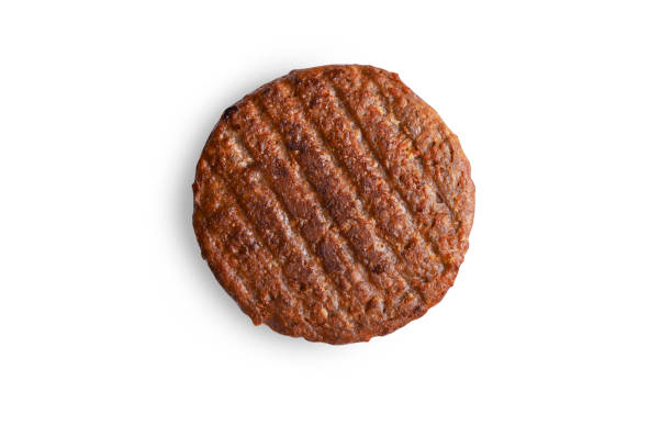 meatless grilled patty i vegan meatless grilled patty isolated on white background meat substitute stock pictures, royalty-free photos & images