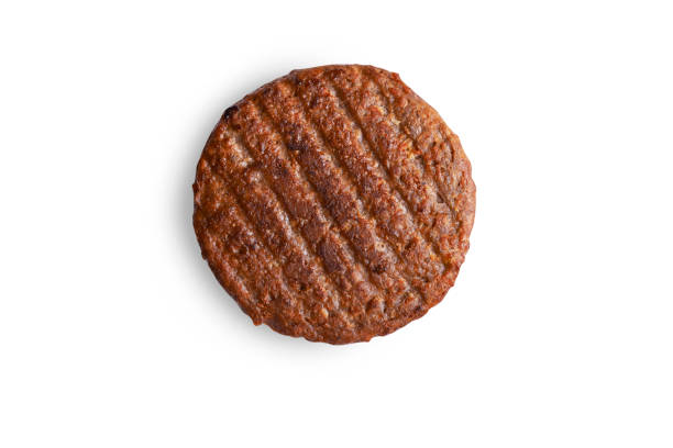 meatless grilled patty i vegan meatless grilled patty isolated on white background veggie burger stock pictures, royalty-free photos & images