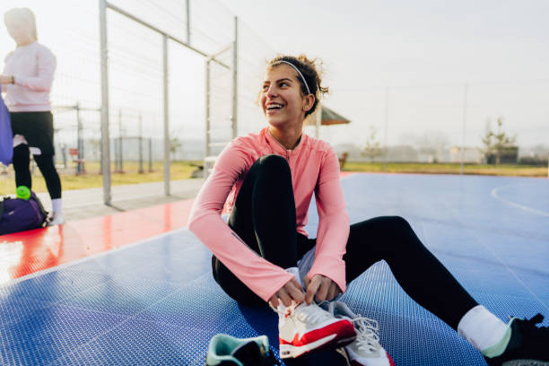 istock Smiling teenage girl getting ready for a game 1210044929