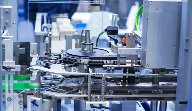 istock pharmaceutical industry. Production line machine conveyor at factory with bottles 1210046178