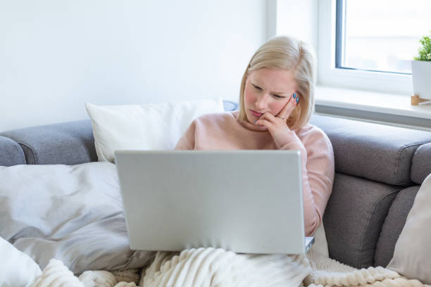 istock Upset young woman using online banking service, problem with blocked credit card, using laptop, irritated girl checking balance, internet fraud concept, bankruptcy or debt, overspend 1210047823