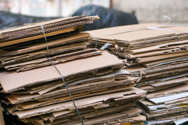 istock Bales of cardboard and box board with strapping wire ties 1210049660