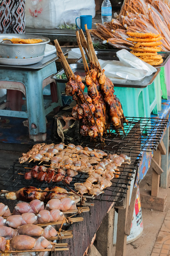 asian street food skewers with chicken and frog