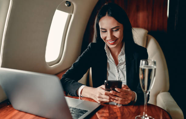 istock Business woman in private jet 1210052780