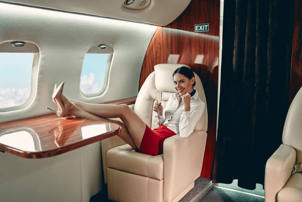 flug attedant in privatjet - vehicle interior corporate jet jet private airplane stock-fotos und bilder