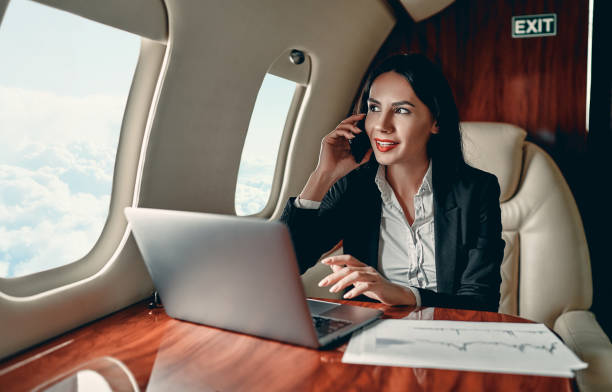 istock Business woman in private jet 1210052820
