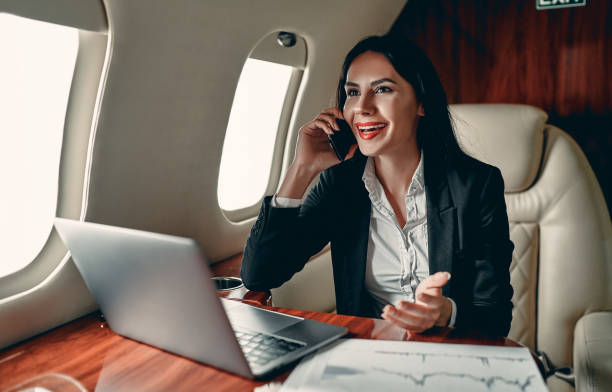 istock Business woman in private jet 1210052909