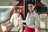 flug-attedant-in-privatjet.jpg?b=1&s=170