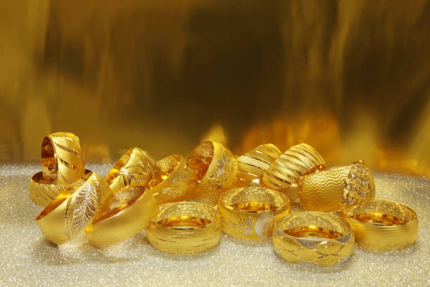 istock Elegant gold bracelets. Yellow gold. 1210054142