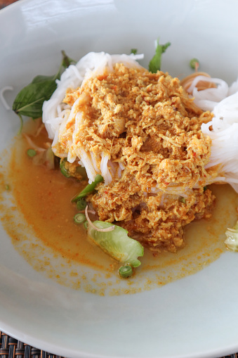 Cambodian noodle dish with crab meat and curry