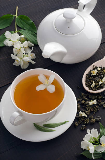 istock Cup of  tea with jasmine flowers 1210055643
