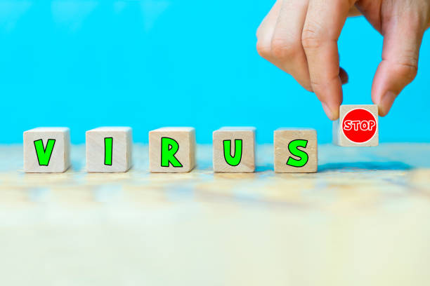 istock Stop virus concept.  Hand choosing stop words for disease 1210056181