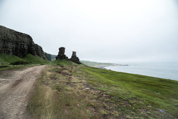 In the very North of Russia, on the shore of the Barents sea, There are two brothers rocks. Two rocks thirty meters high stand apart from the plateau