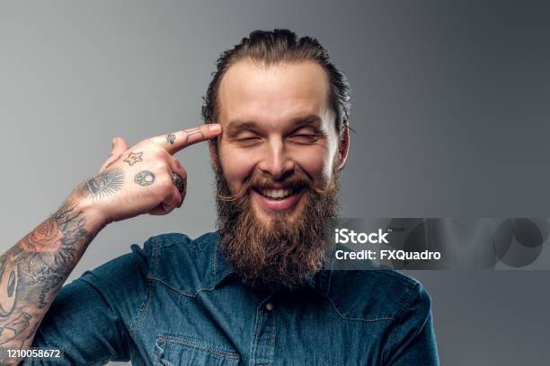 Cheerful Man With Beard And Tattooes Stock Photo - Download Image Now - Tattoo, Hand, Men - iStock Cheerful Man With Beard And Tattooes Stock Photo - Download Image Now - Tattoo, Hand, Men - iStock