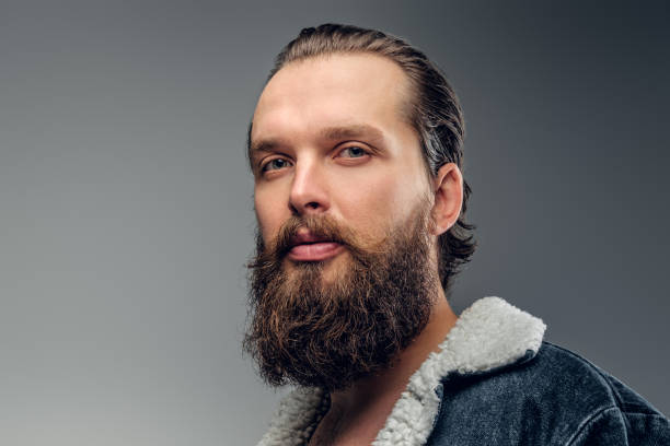 istock Portrait of bearded man in denim jacket 1210059512