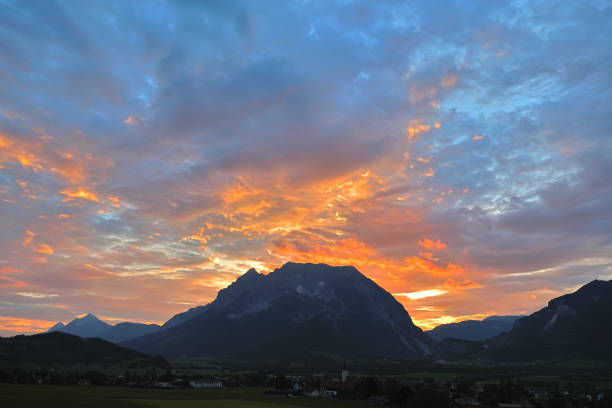 istock Volcano like sunset on Grimming Peak and Dachstein Mountains, Alps (Alpes, Alps, Alpi, Alps, Alpe), Styria (Styria), Austria (Austria) 1210070071