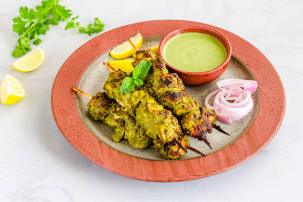 istock Indian Green Chicken Kebabs on White Background 1210071702