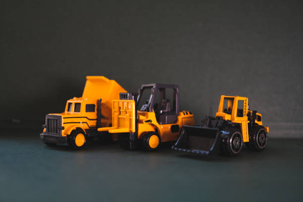 istock Closeup group of construction vehicle 1210074914