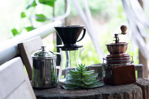 istock Dripped coffee equipment on wooden table 1210075260
