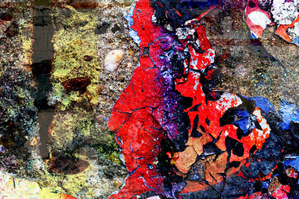 istock Surface texture with many colors on a concrete wall with a strong porous and cracked surface structure. For abstract backgrounds. 1210075684