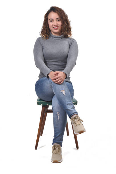 istock woman with chair on white background 1210080028