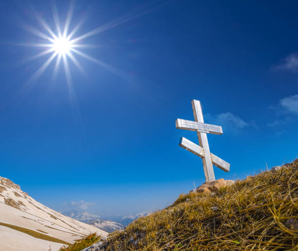 istock religious monument, cross on a mount slope 1210080063