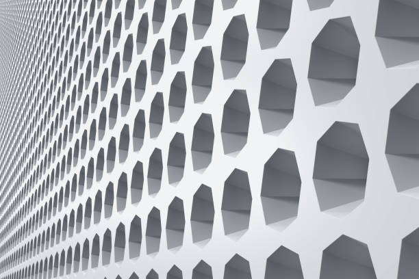 istock Industrial building exterior front wall decorated with hexagonal niches 1210084033