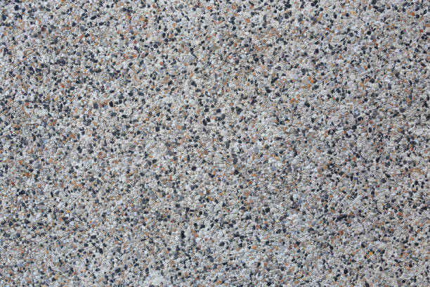 istock Concrete mix with small gravel for background 1210086597