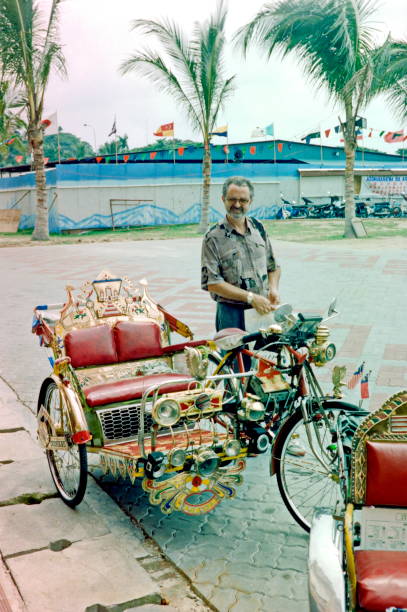 istock The Nineties. Wating for the rickshaw's driver. Melaka, Malaysia. 1210088590