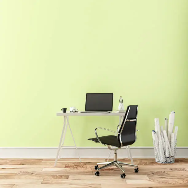 Workdesk with decoration on hardwood floor in front of empty light green wall with copy space. 3D rendered image.