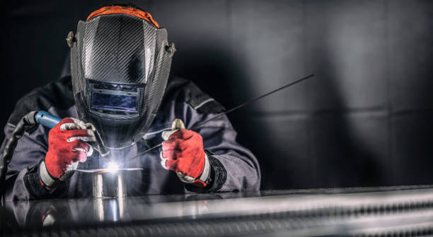 Welder industrial worker welding with argon machine Welder industrial worker welding with argon machine. argon stock pictures, royalty-free photos & images