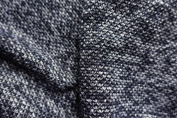 istock Folded thick heather blue gray fabric from above 1210102973