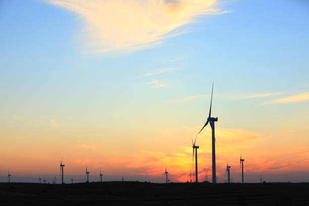 istock In the evening, the silhouette of wind turbines 1210104419