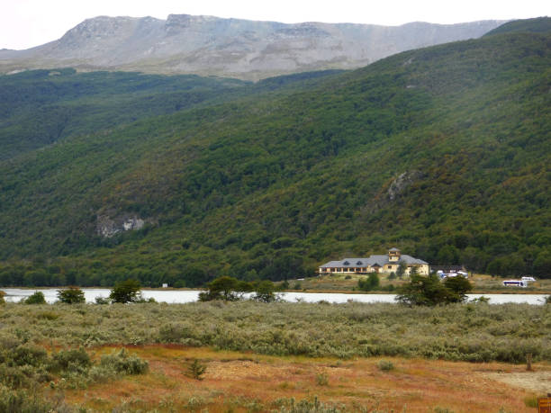 istock An only house rounding by mountains and lakes 1210105020