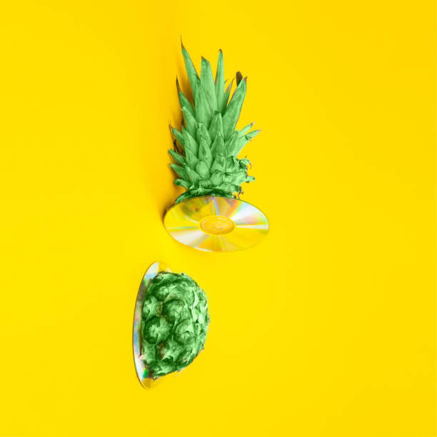 istock Sliced green pineapple on a yellow background. Minimalism and abstraction. 1210105591