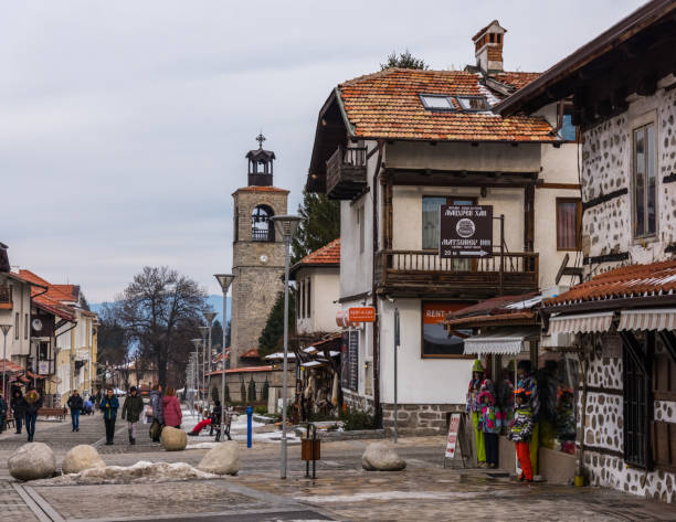 Bansko, Bulgaria-February 11 .2020. Old streets of Bansko in Bulgaria.Nice Sunny weather. Holidays people relax in the ski resort in the winter