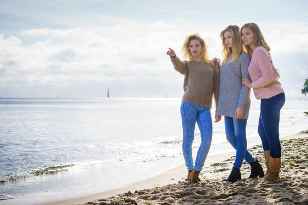 istock Three fashionable models outdoor 1210108543
