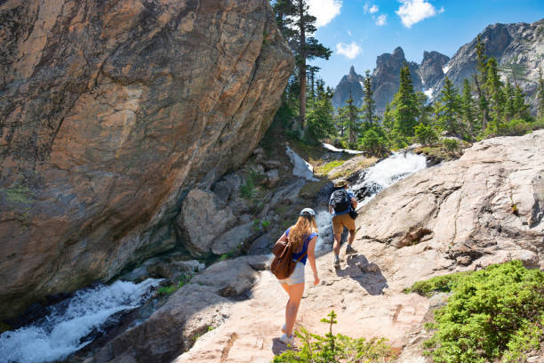 istock Couple on summer vacation trip in Colorado mountains. 1210108809