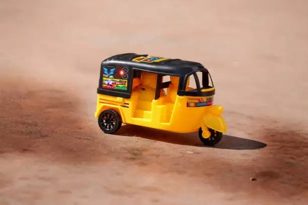 Photo of Indian Auto Rickshaw ,Yellow and black auto rickshaw toy,beautiful view of indian