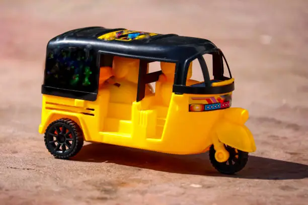 Photo of Indian Auto Rickshaw ,Yellow and black auto rickshaw toy,beautiful view of indian