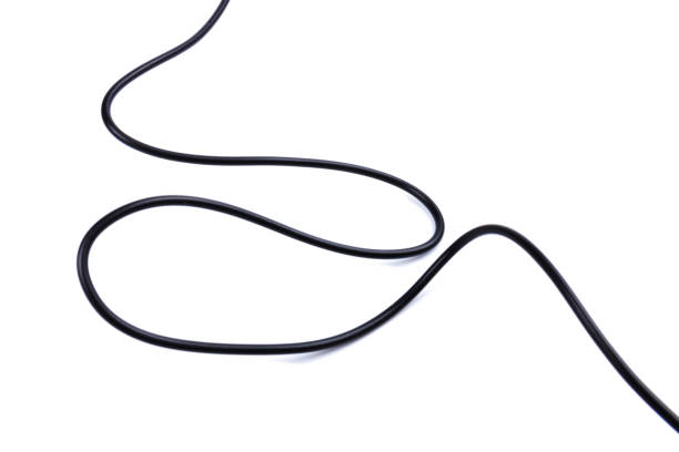 istock Black electrical  flexible wire isolated on white background. Network, connection industrial power energy cables. 1210114635