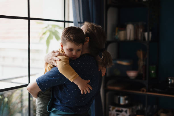istock Grandmother comforting grandson during tantrum 1210115764