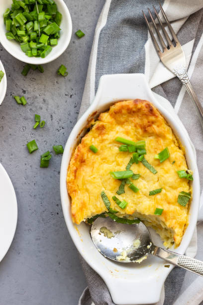 istock Potato casserole with fish and cheese on a light grey background. 1210116814