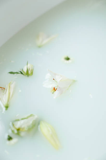istock White flowers in milk bath 1210117516