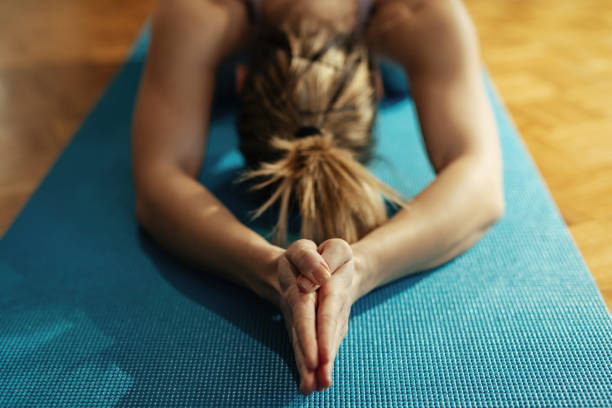 istock Relaxing her muscles after sports training! 1210120001