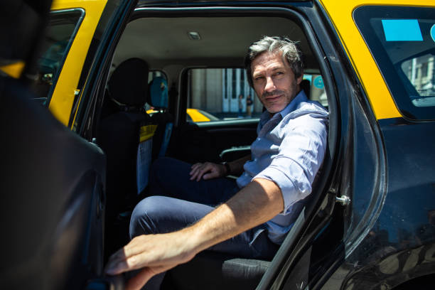 istock Getting out of the taxi 1210121507