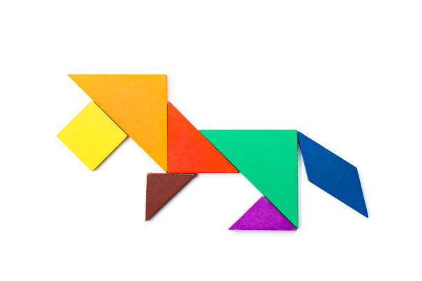 istock Color wood tangram puzzle in lion shape on white background 1210121516