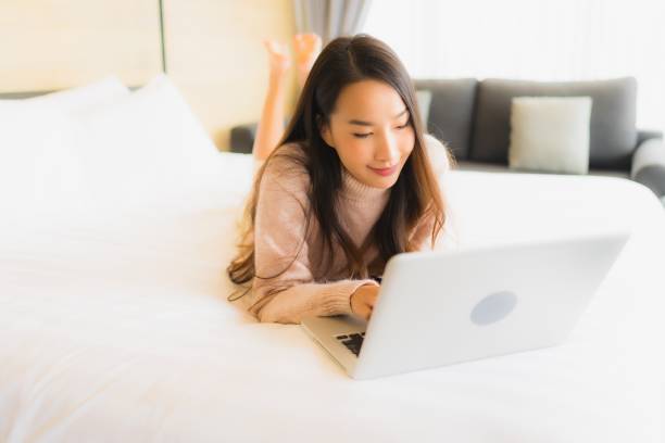 istock Portrait beautiful young asian woman using laptop for working 1210123376