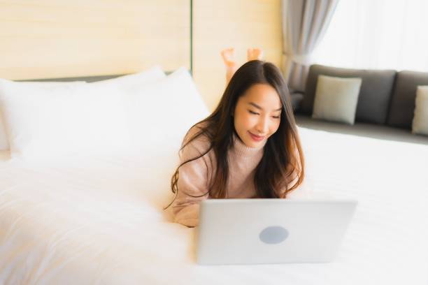 istock Portrait beautiful young asian woman using laptop for working 1210123427