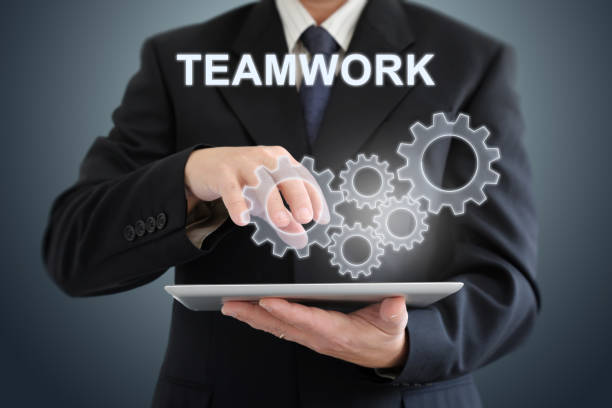 Teamwork cogwheel cooperation businessman togetherness partnership